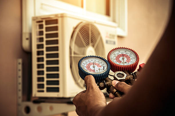 Professional Heat Pump Repair technician working in Millington, NJ
